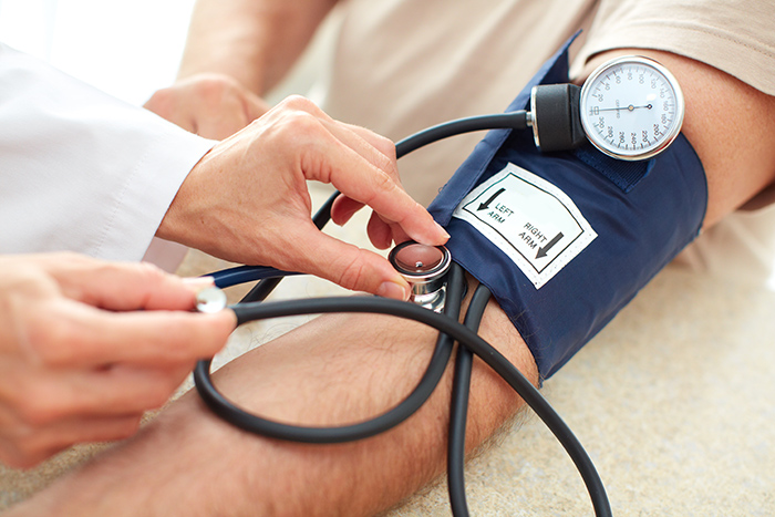Blood pressure measuring. Doctor and patient. Health care.