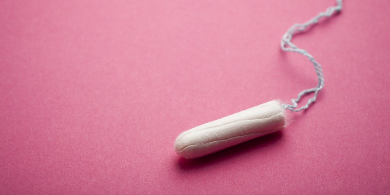 Tampon on pink background
