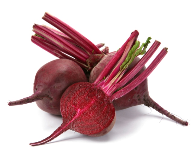 Beet purple vegetable with shadow on white background